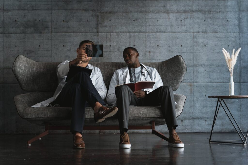 Two doctors reviewing patient assessment results