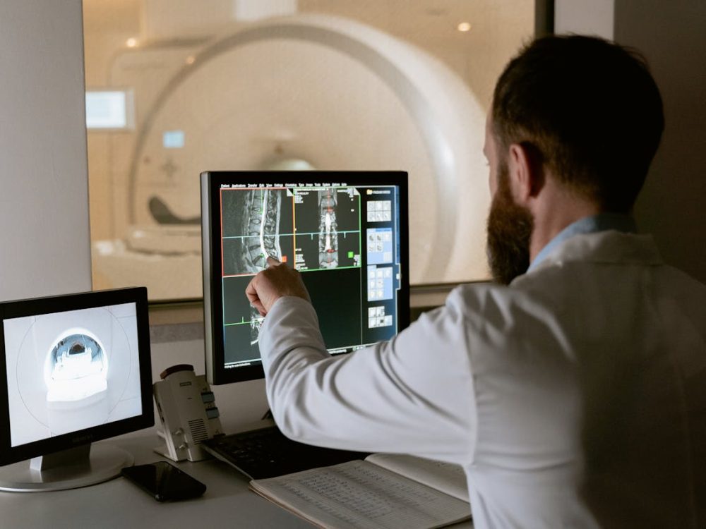 A Doctor reviewing a medical scan assessment