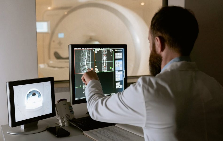 A Doctor reviewing a medical scan assessment